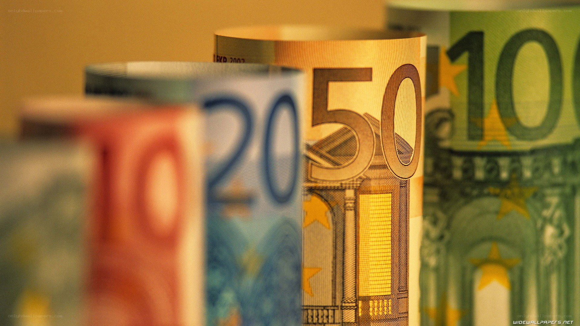 Euro banknotes in a row