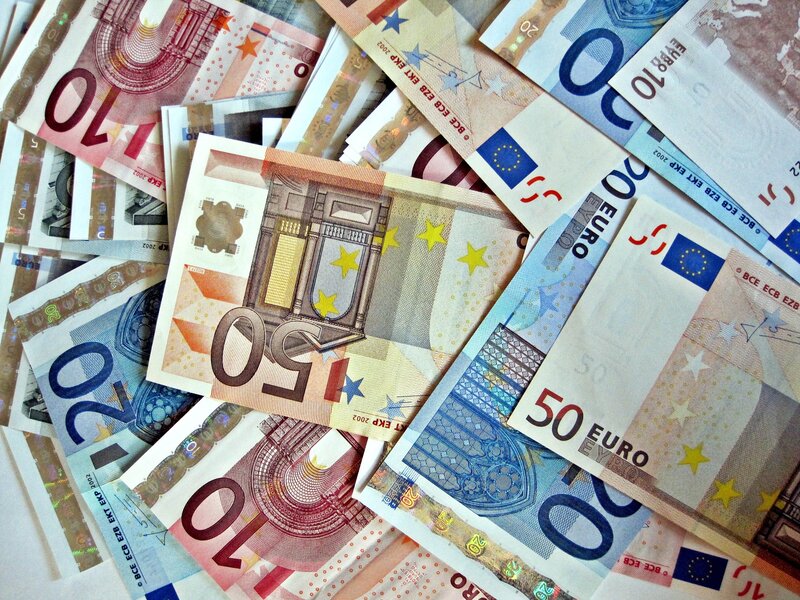Euro banknotes scattered