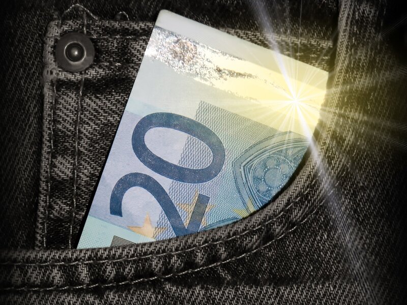 Euro bill in jeans pocket