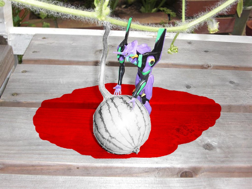 Evangelion figure with watermelon