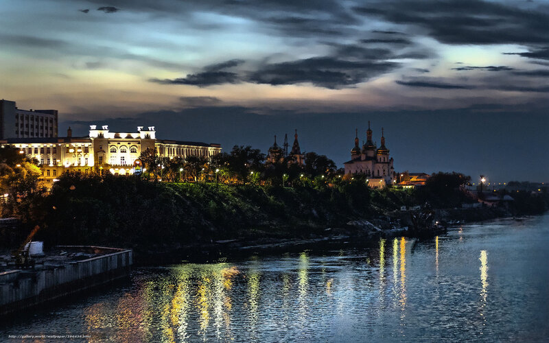 Evening cityscape by the river