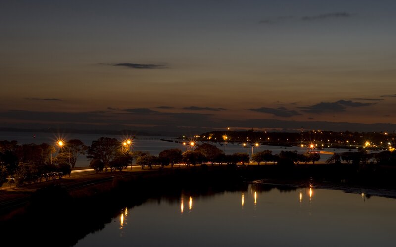 Evening lights on a coastal town
