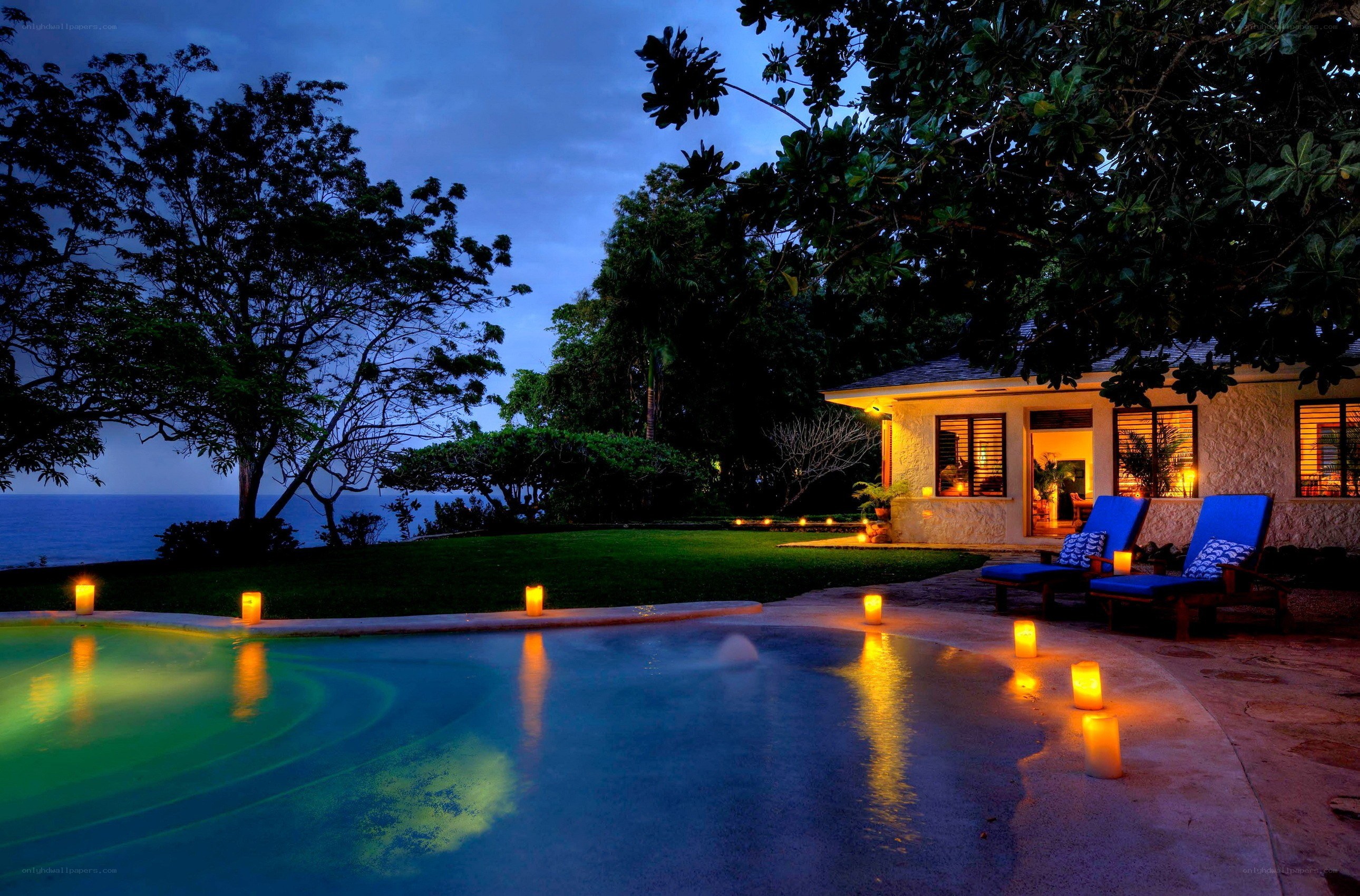 Evening poolside at a tropical villa