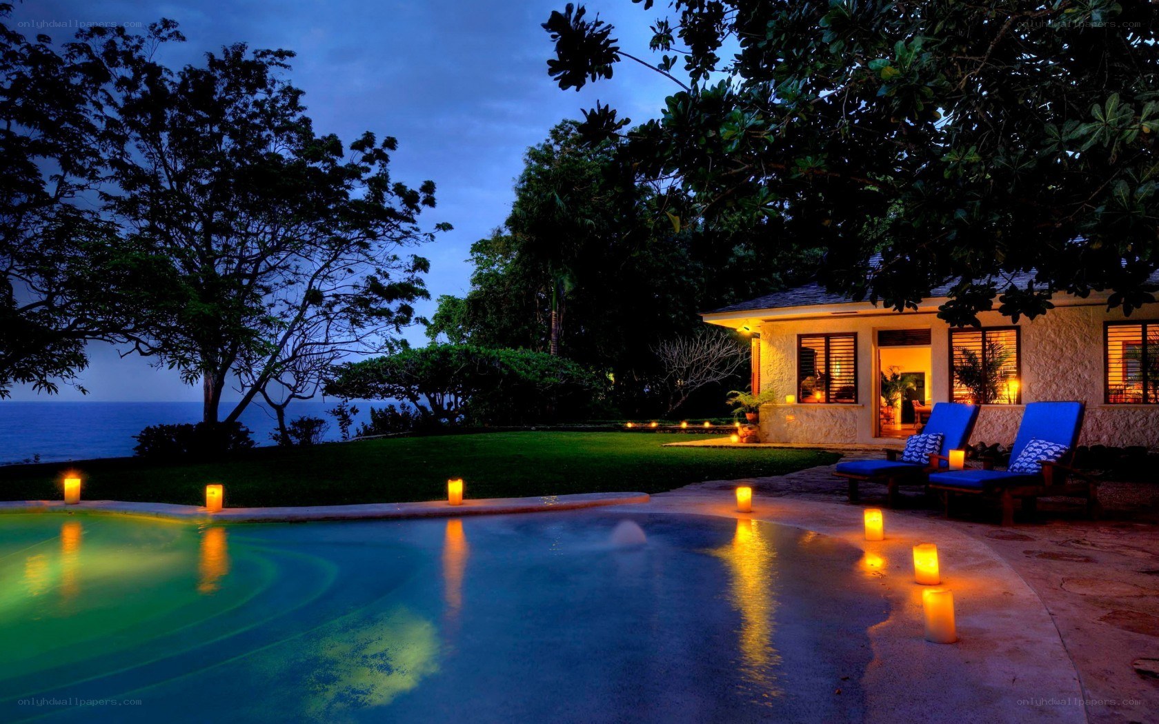 Evening poolside at a tropical villa