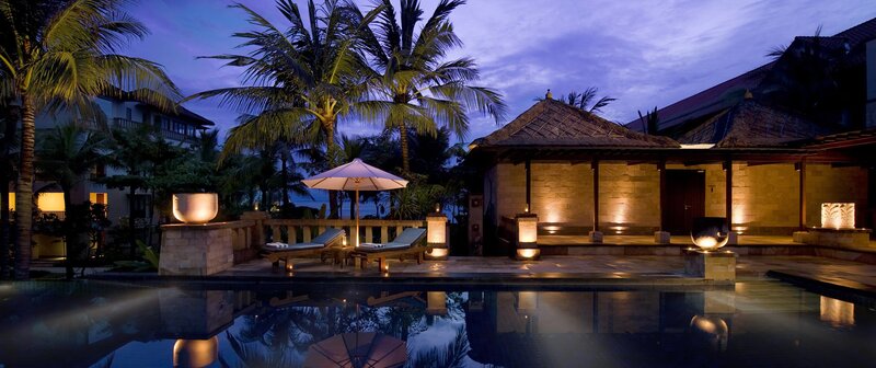 Evening poolside resort scene