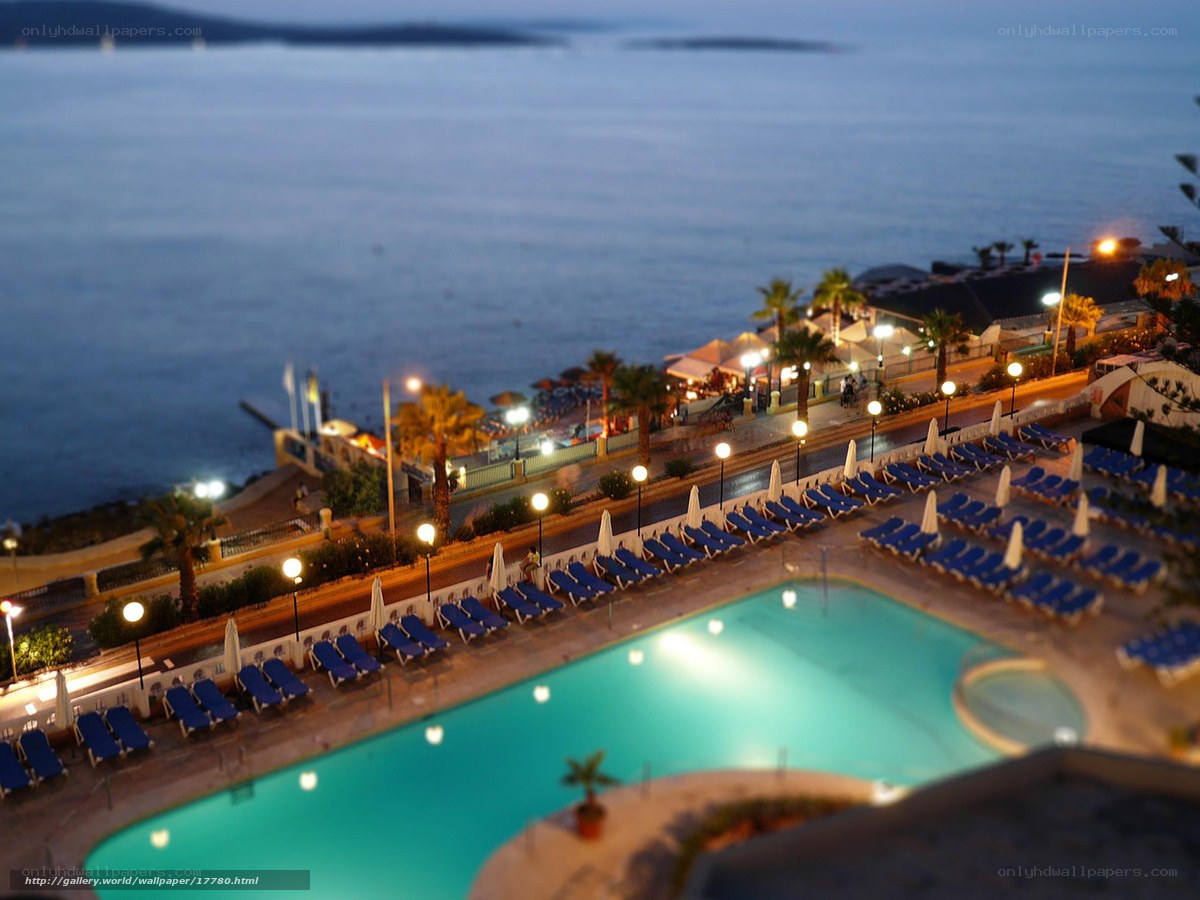Evening poolside view of resort