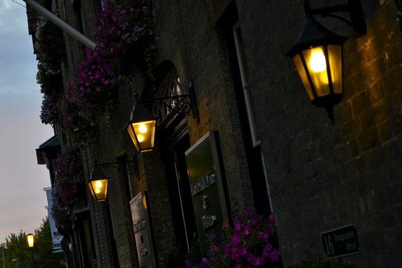 Evening street lamps and flowers