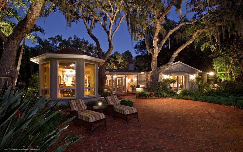 Evening view of a home with gazebo