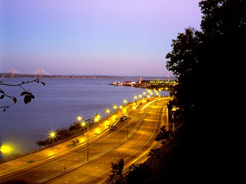 Evening view of a river and bridge