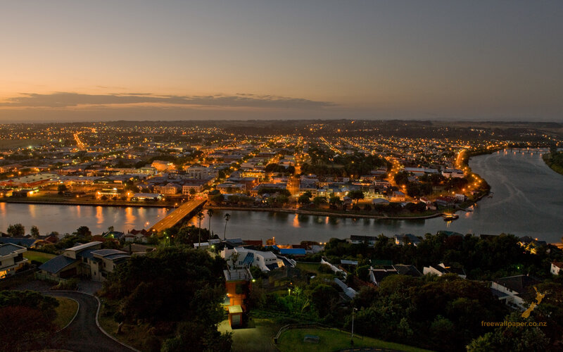 evening view of a riverside town