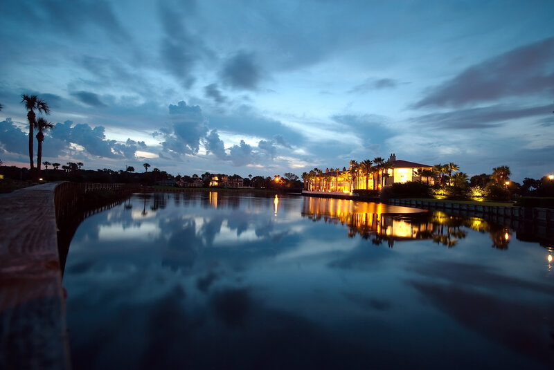 Evening view of waterfront homes