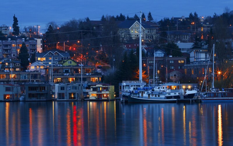 Evening view of waterfront homes