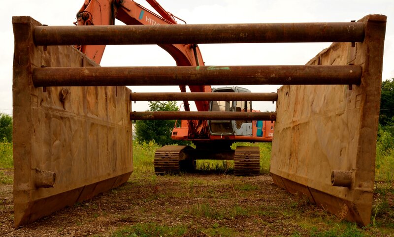Excavator Behind Barriers
