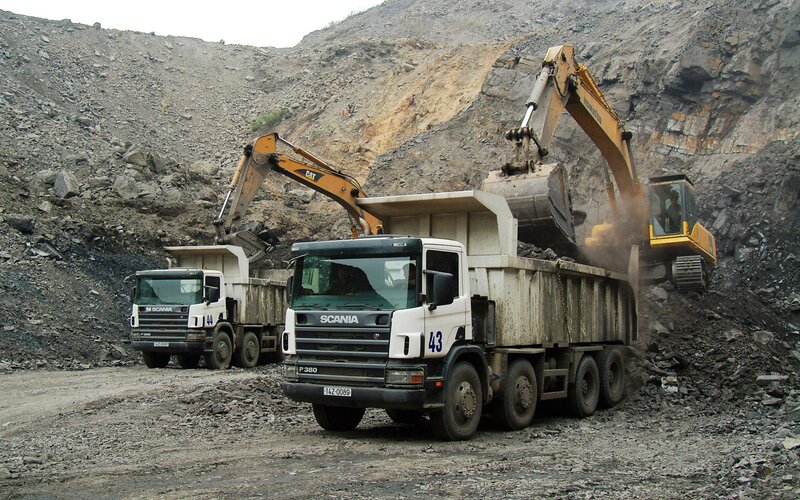 Excavator Loading Trucks — Gray