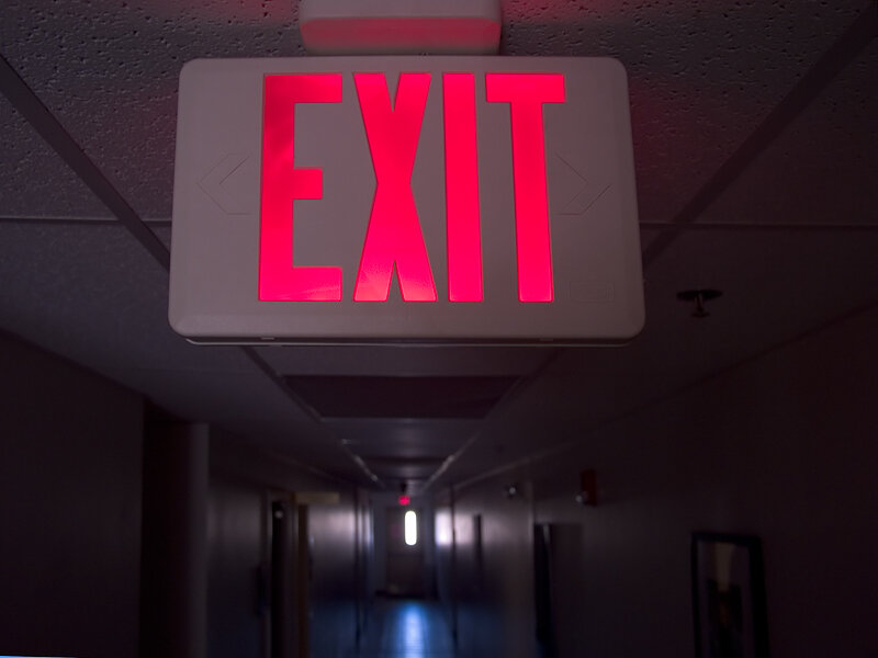 Exit Sign in Hallway — Red