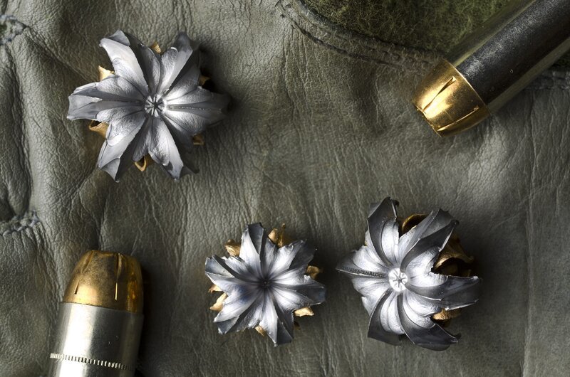 Expanding Bullets on Leather — Gray