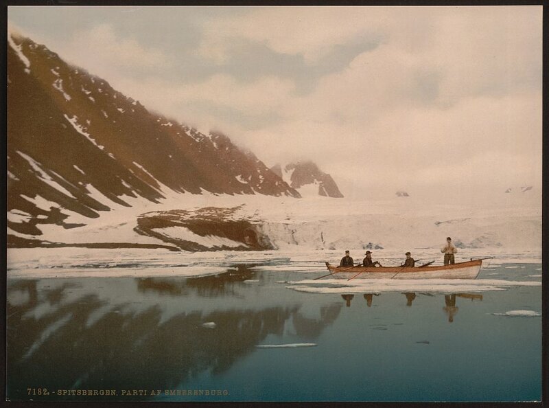 Explorers in a boat near Spitsbergen
