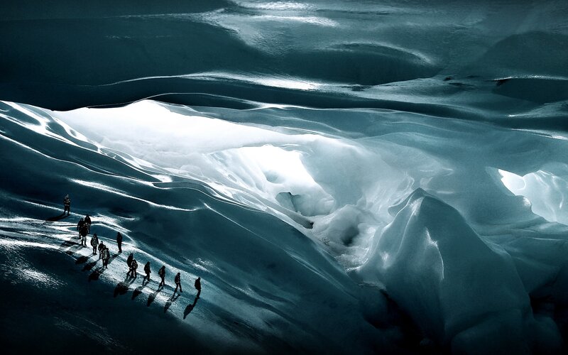 Explorers in an ice cave