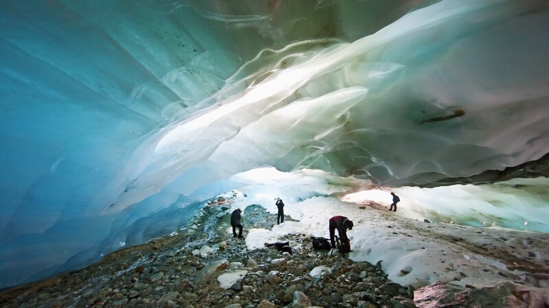 Explorers in an ice cave