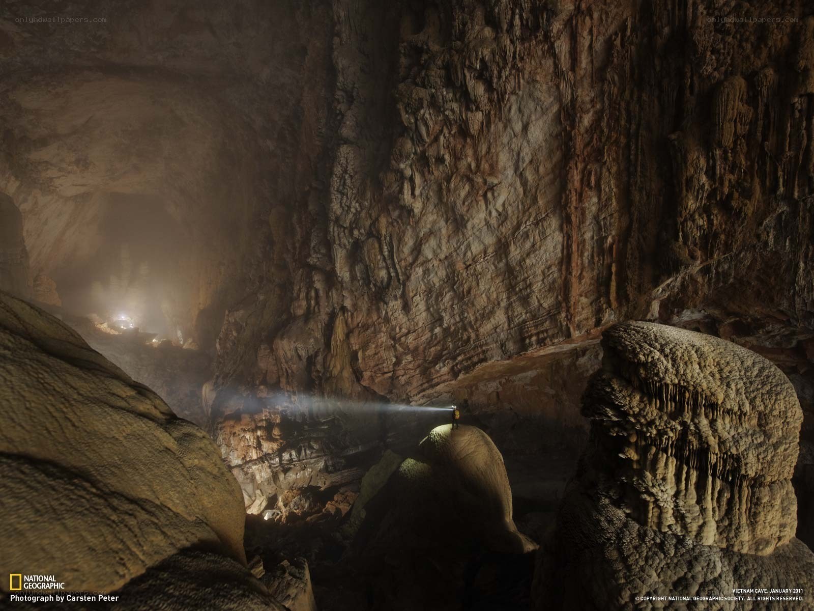 Exploring a vast cave chamber