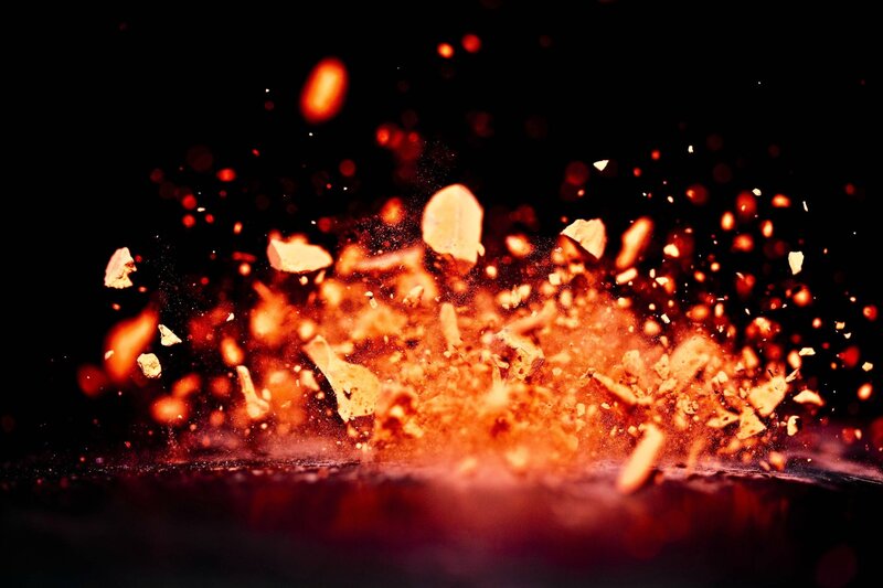 Explosion of orange fragments