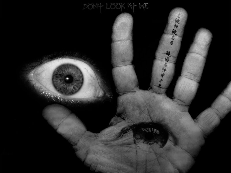 eye and hand with text