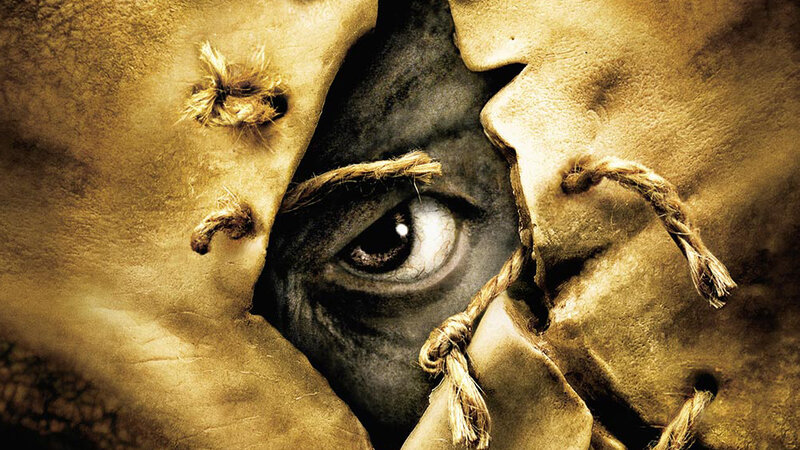 Eye Behind Torn Fabric