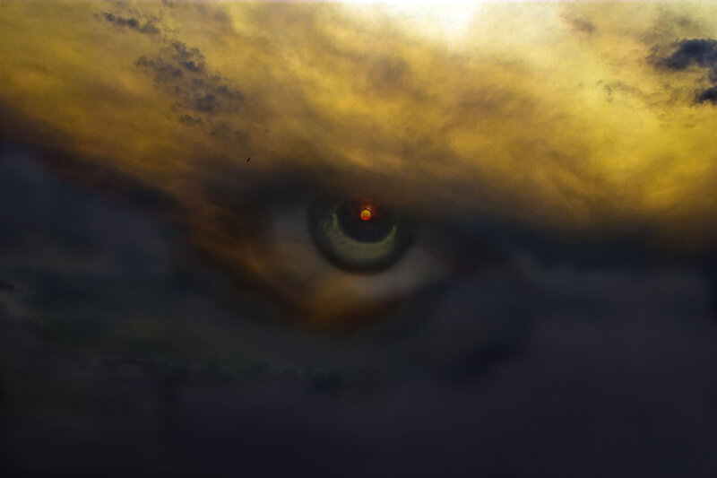 Eye in Cloudy Sky