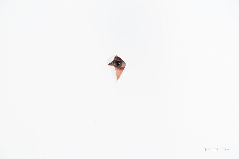 eye peeking through hole