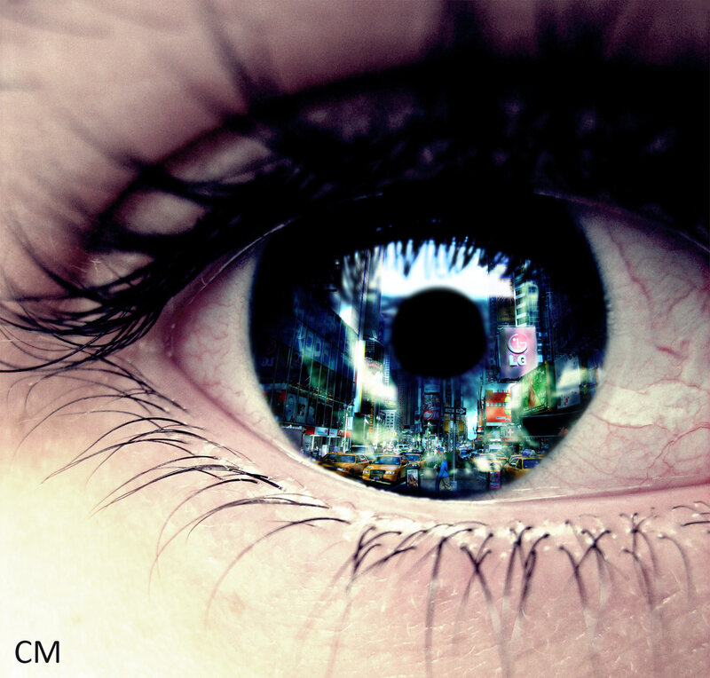 eye reflecting cityscape