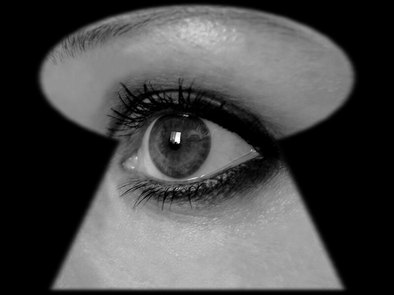 eye seen through keyhole