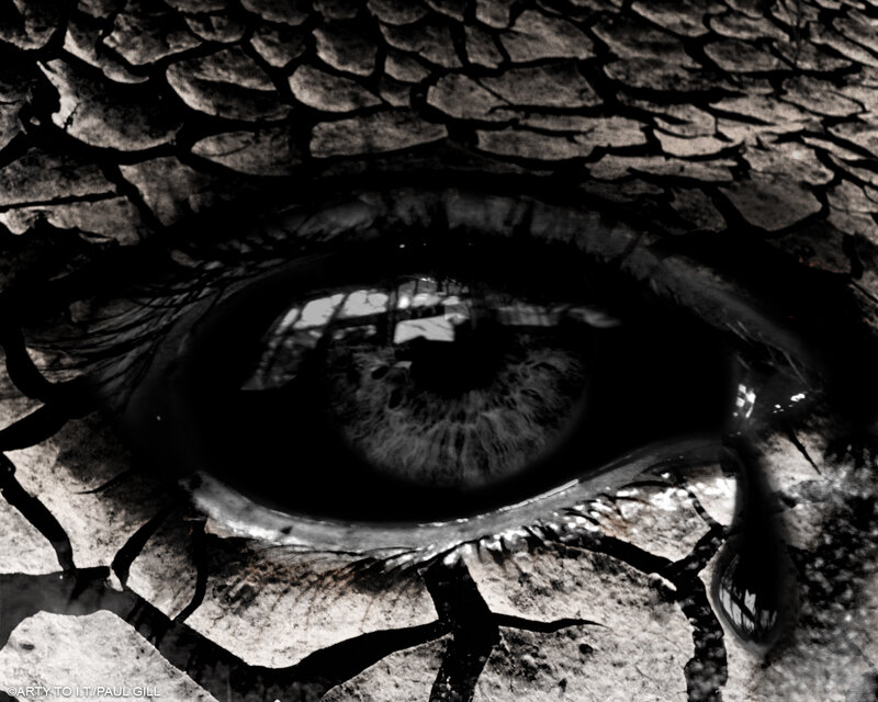 eye with cracked earth texture