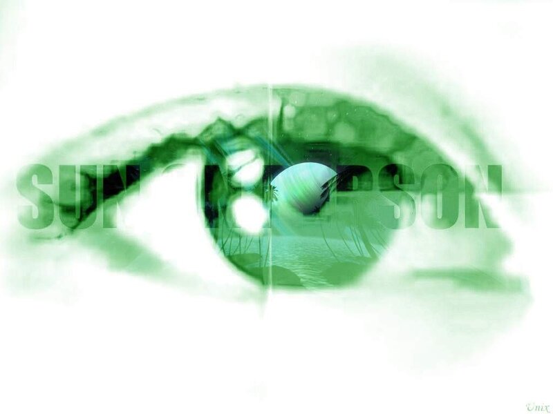 eye with green landscape reflection