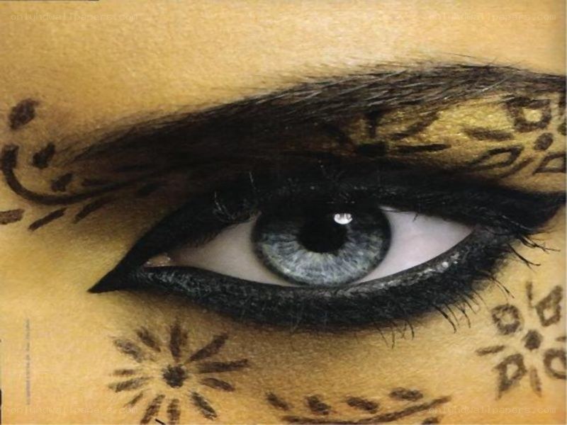 eye with henna and makeup