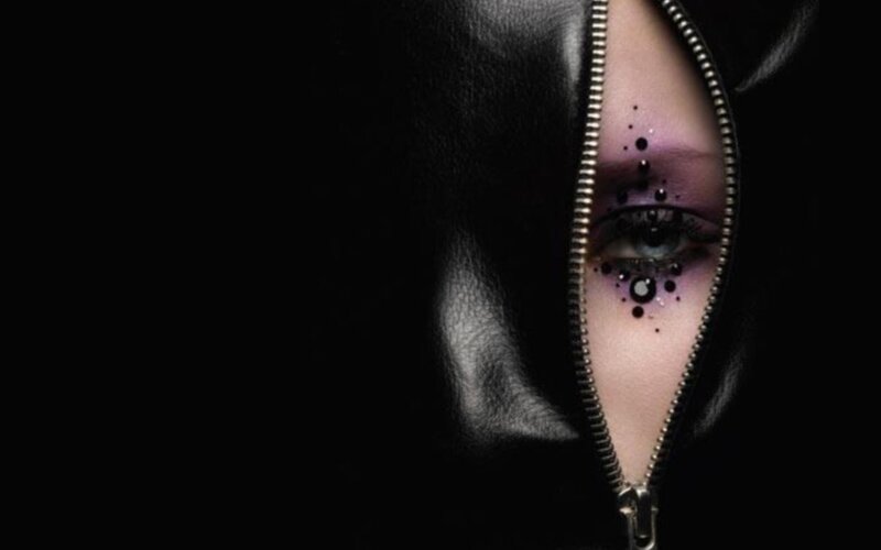 eye with purple makeup
