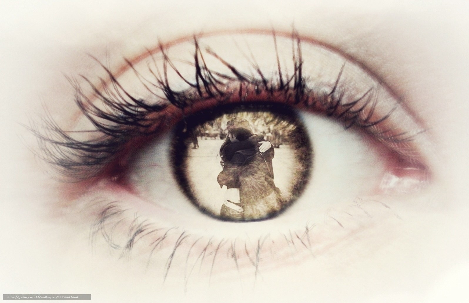 eye with reflection of embrace