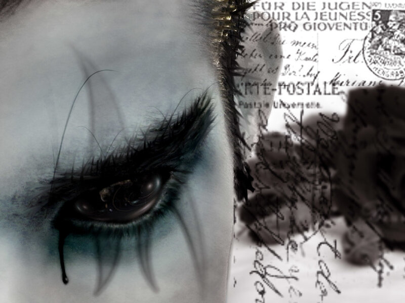 eye with tear and postcard