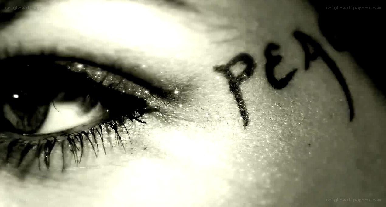 eye with writing on skin