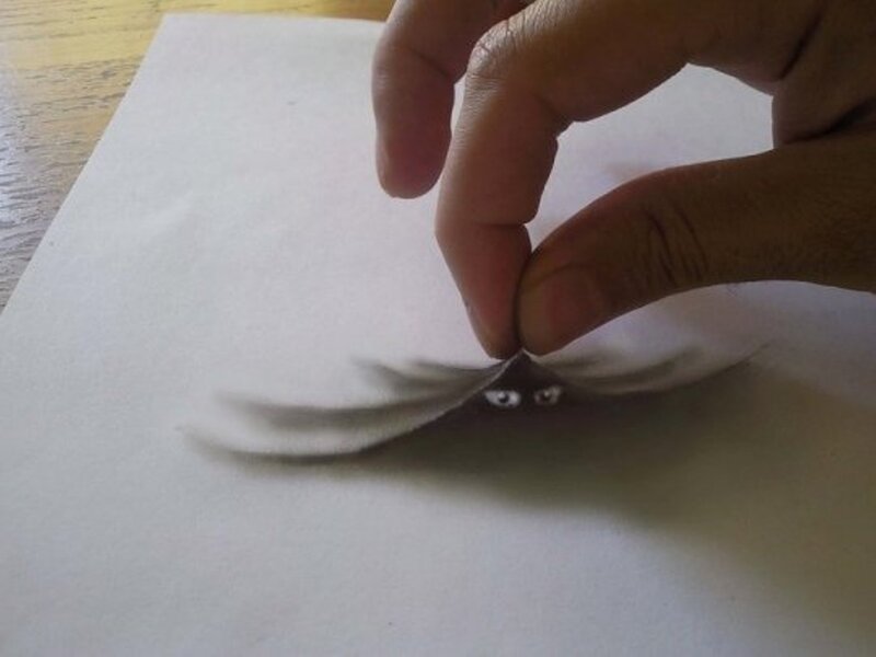 Eyes under Paper