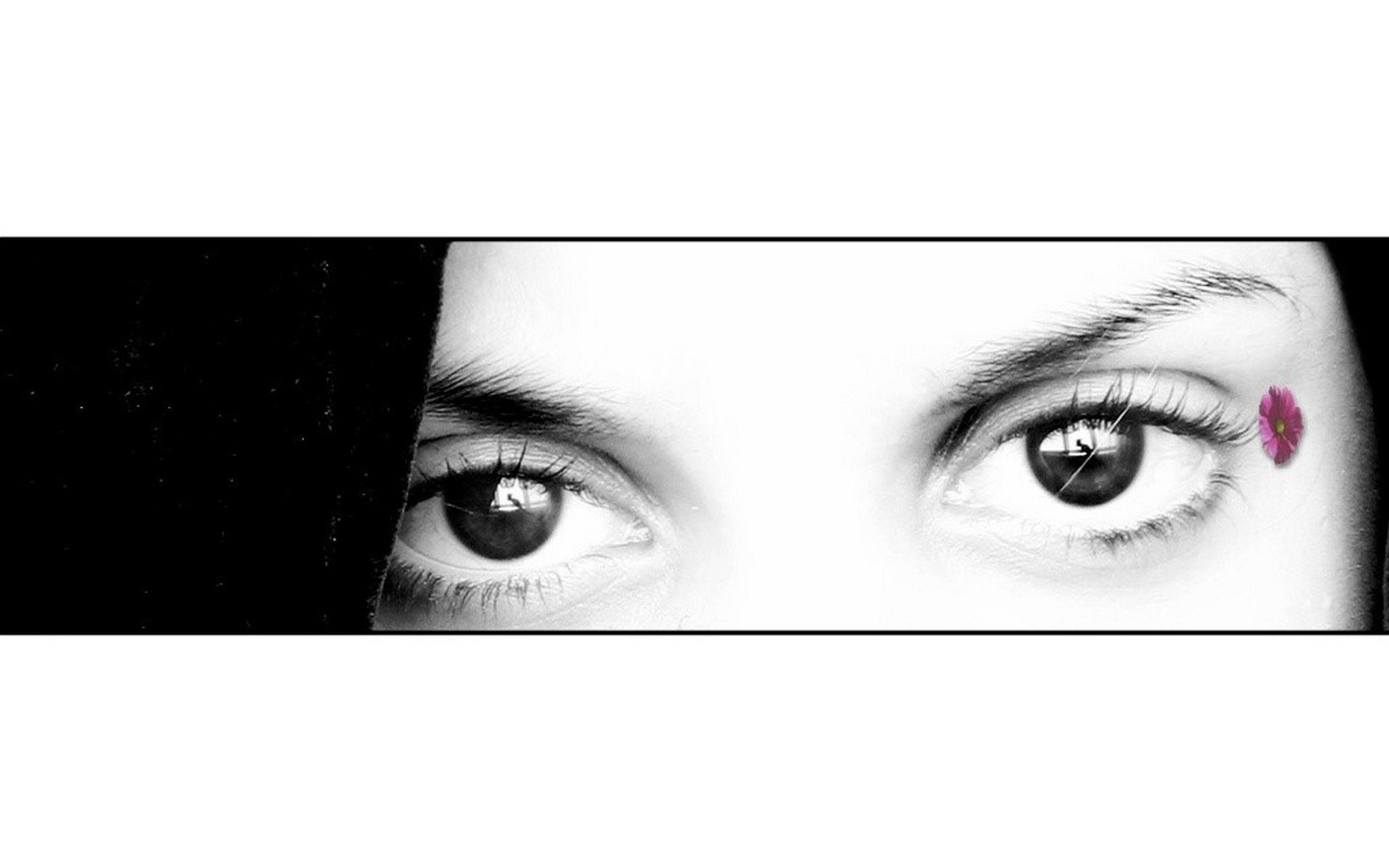 eyes with a pink flower