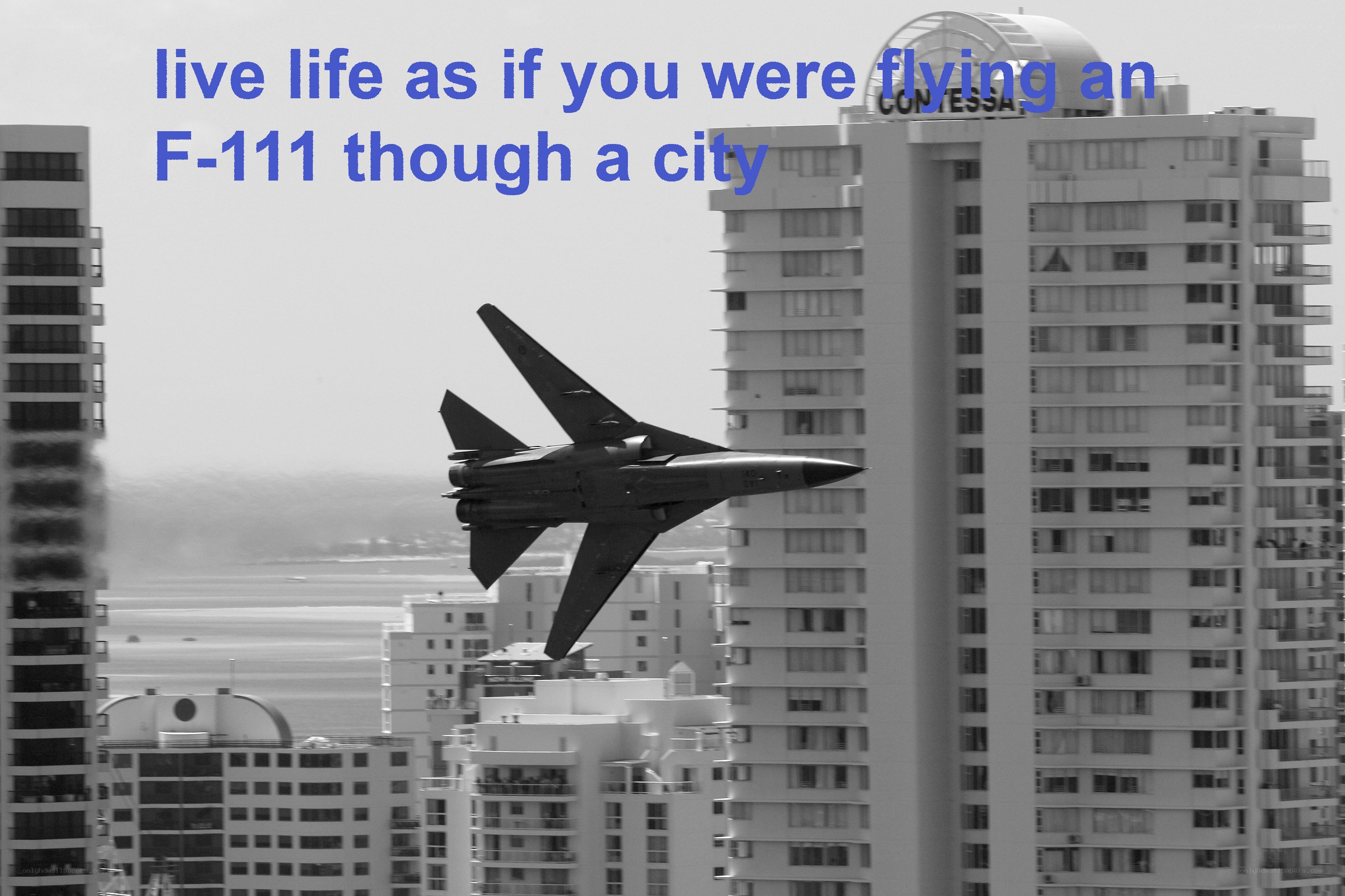 F-111 jet over city
