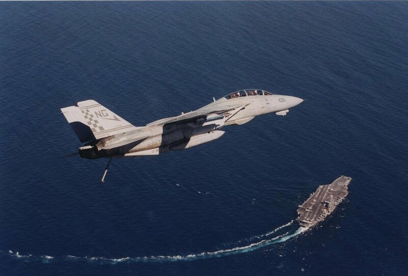 F-14 Tomcat near aircraft carrier