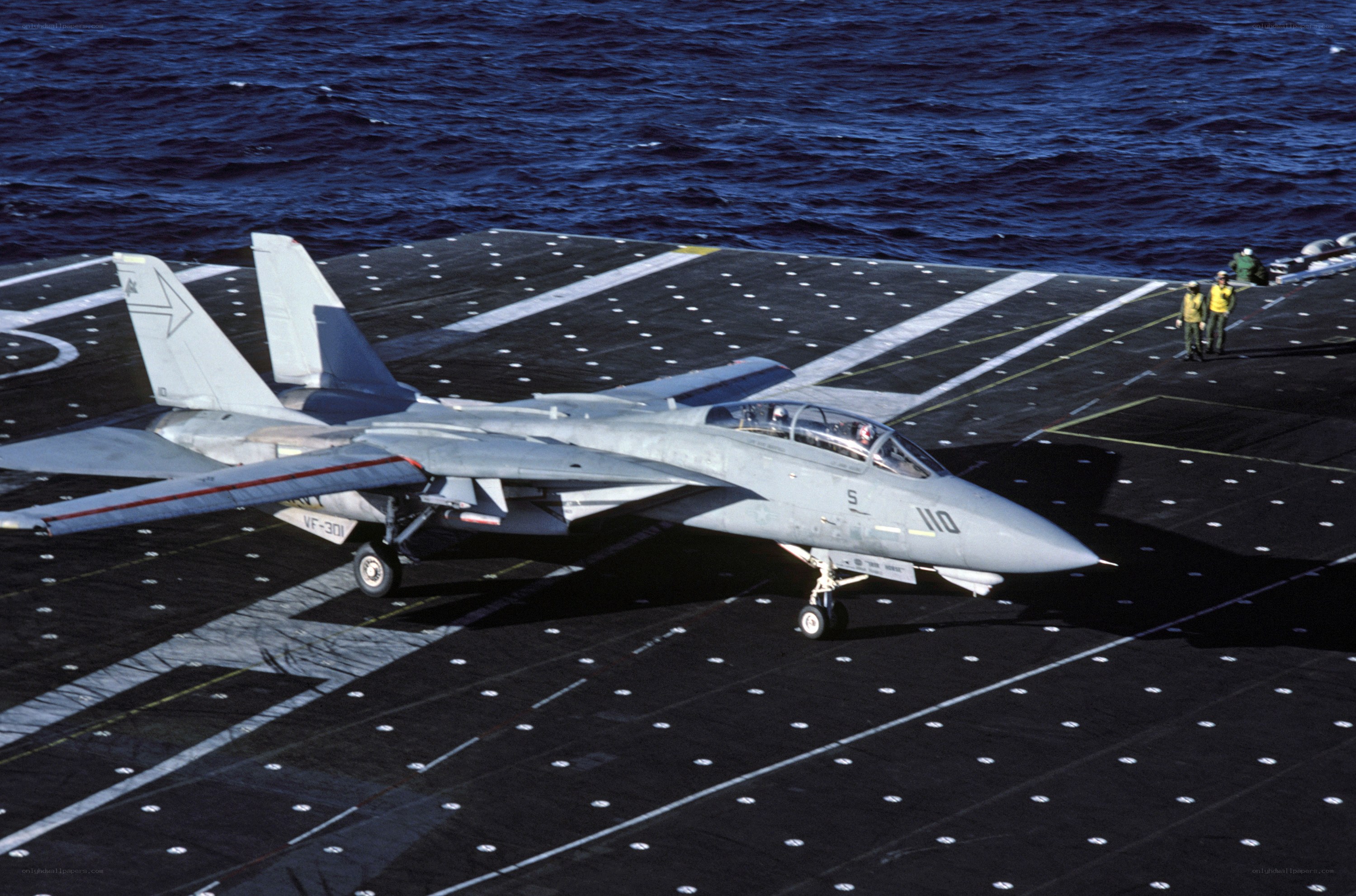 F-14 Tomcat on aircraft carrier deck