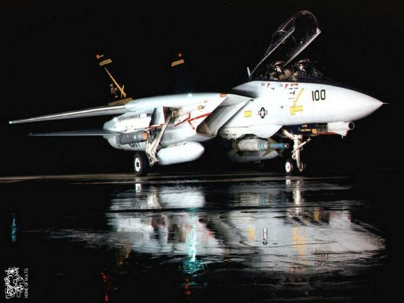 F-14 Tomcat on wet tarmac