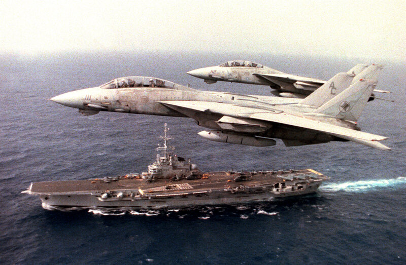 F-14 Tomcats over aircraft carrier