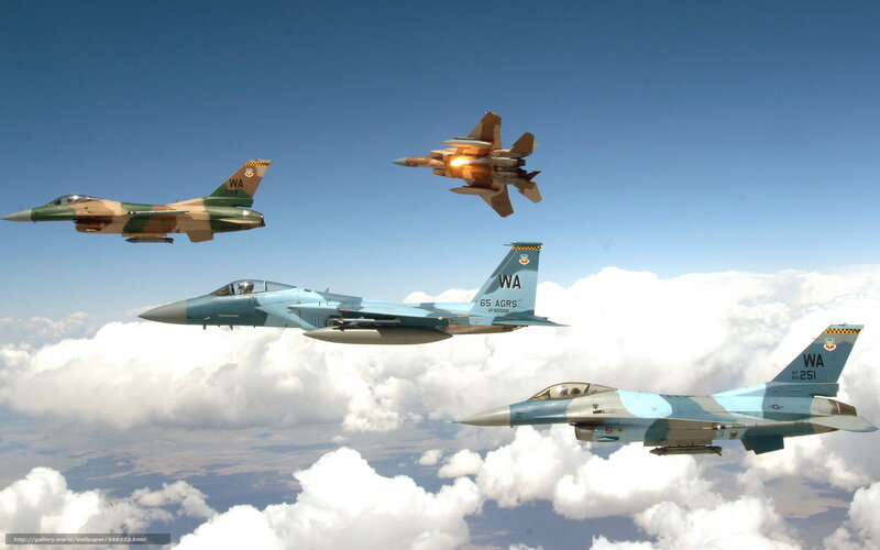 F-15 and F-16 fighter jets in formation