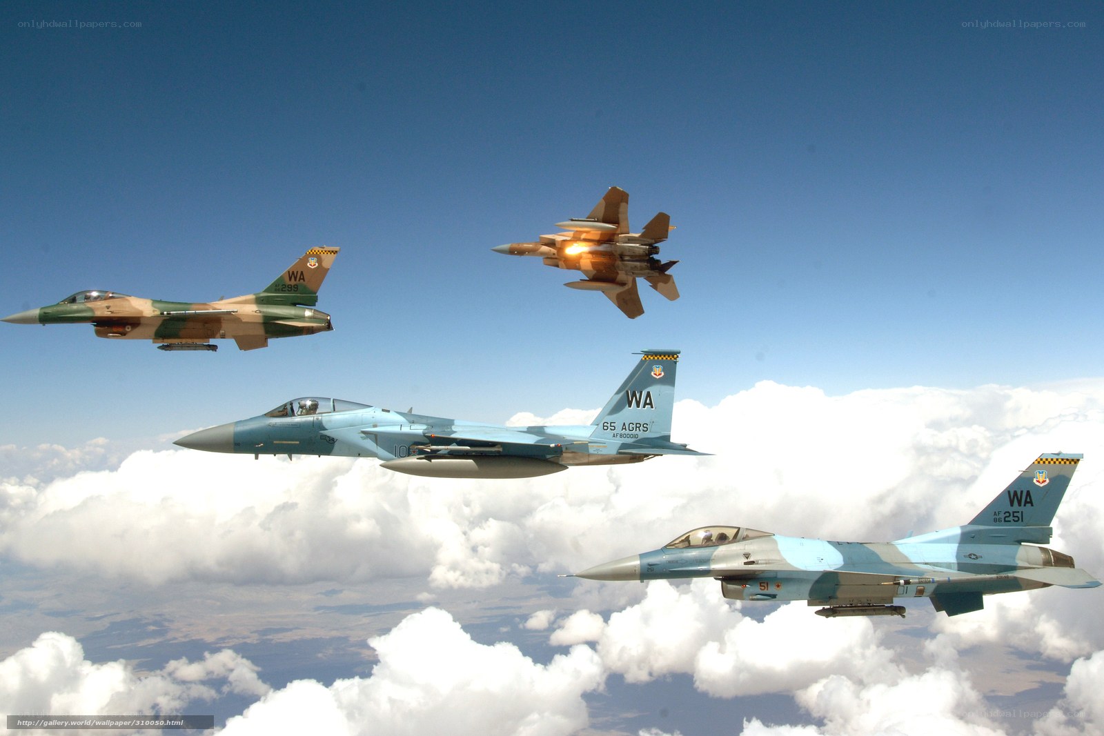 F-15 and F-16 fighter jets in formation