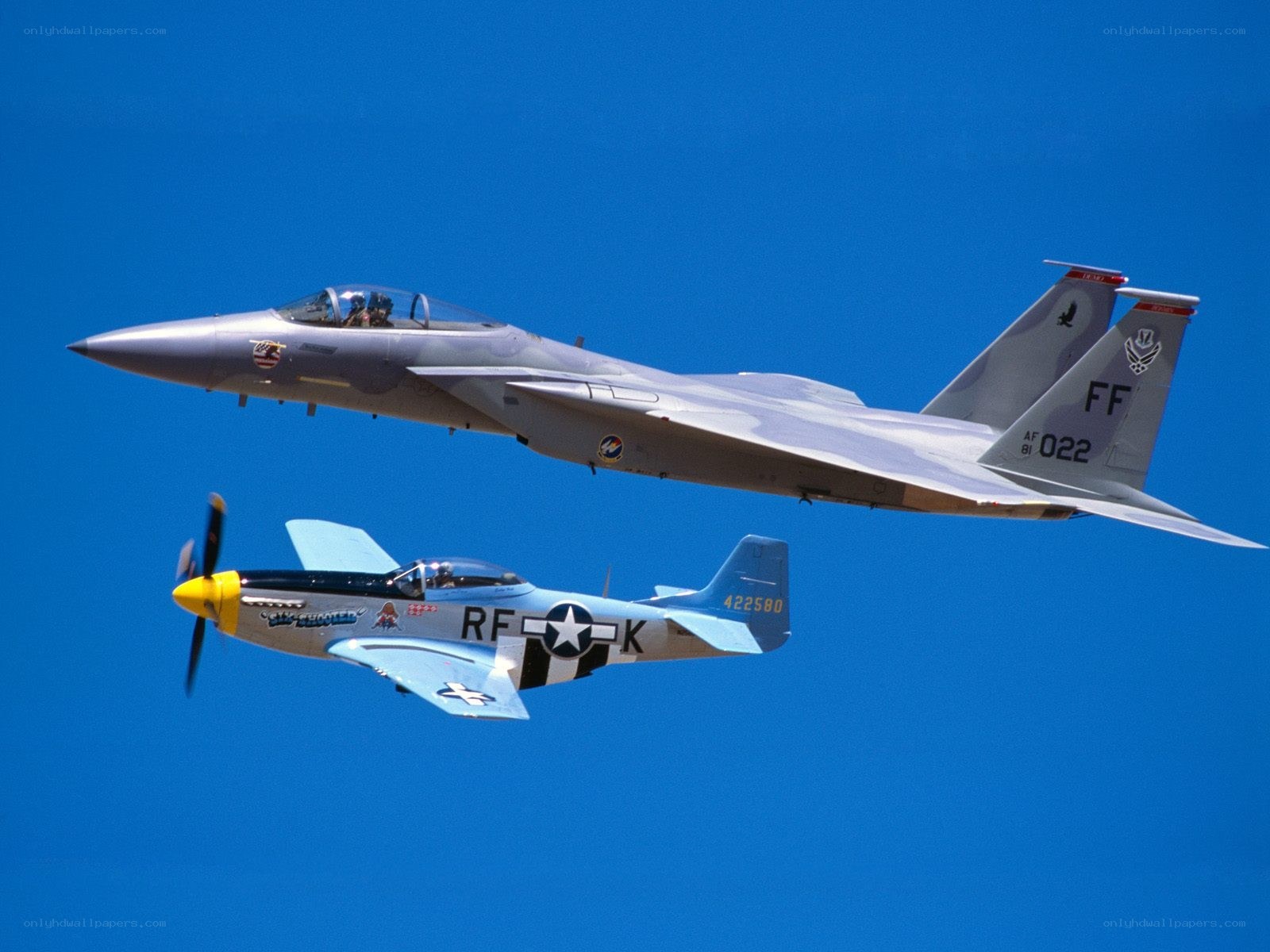 F-15 and P-51 in formation