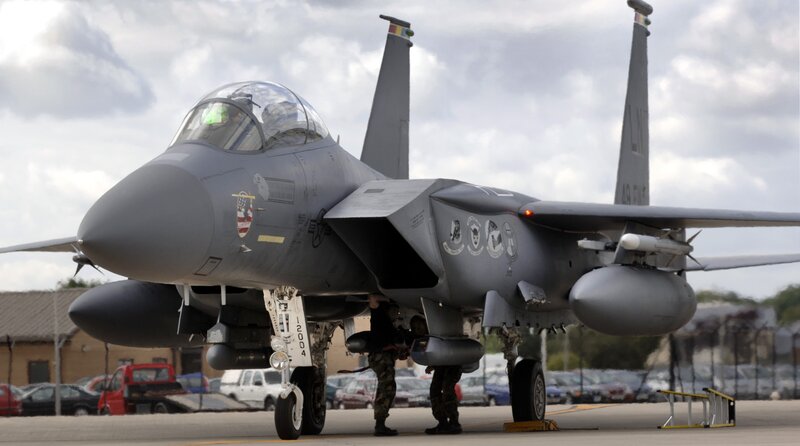 F-15 Eagle Fighter Jet — Gray, Dramatic, Afternoon, Photograph, Military Personnel