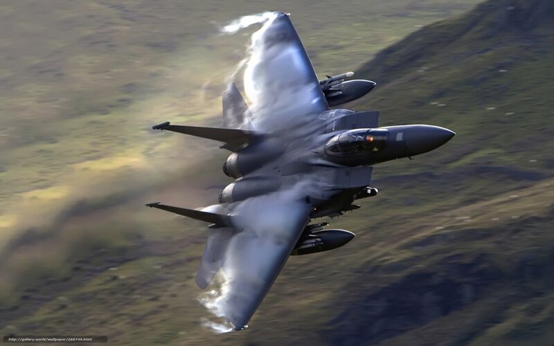 F-15 Eagle Fighter Jet — Gray, Dramatic, Afternoon, Photograph, Mountainous Terrain